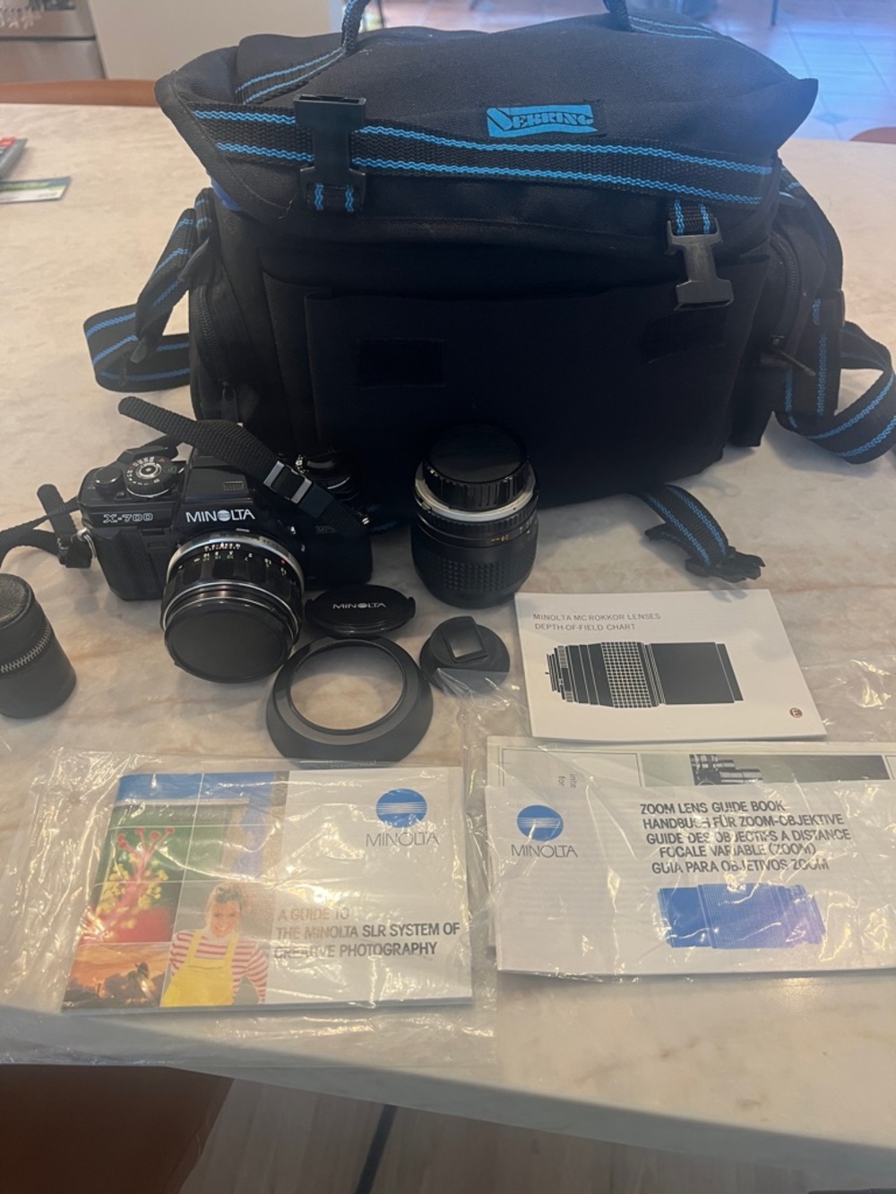 Minolta Camera, lense and Sebring Black Camera Messenger Bag with Blue Trim